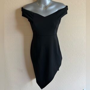 Black off the shoulder asymmetrical mini dress from Fashion Nova